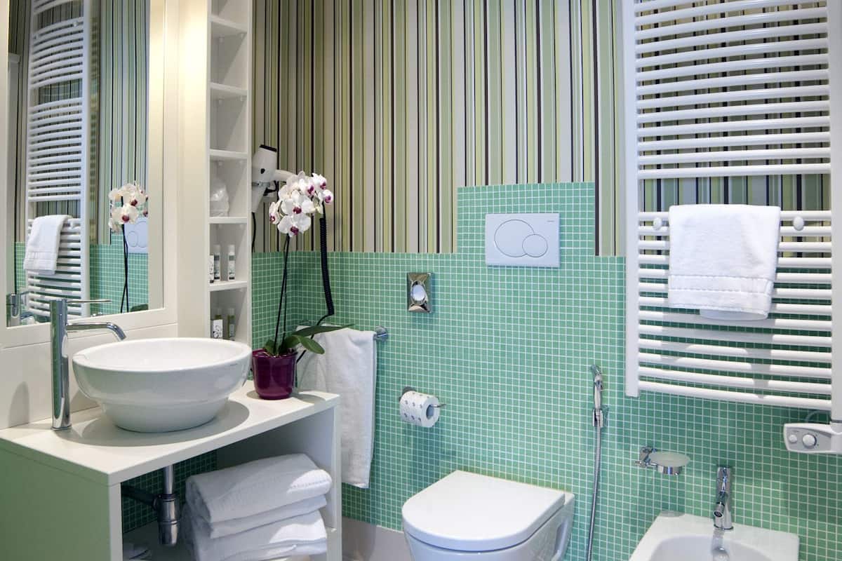 junior suite | bathroom | shower, rainfall showerhead, free toiletries, hair dryer