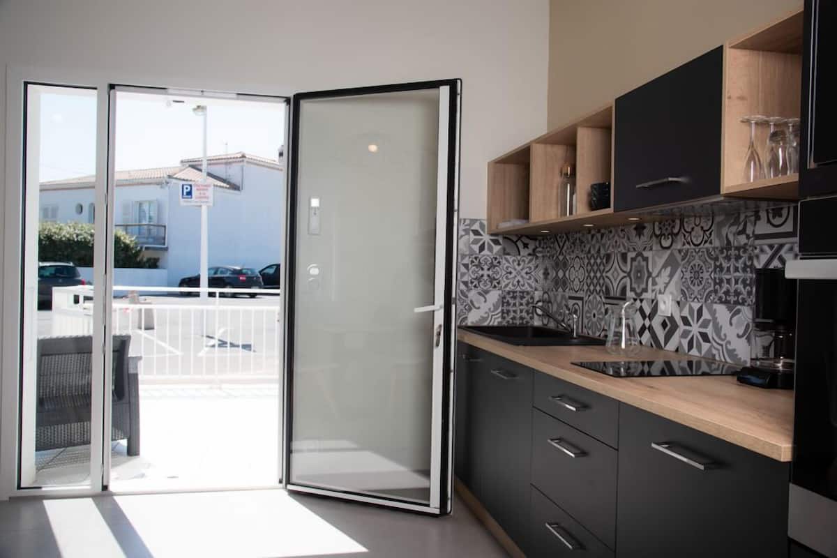 comfort duplex | living area | flat-screen tv