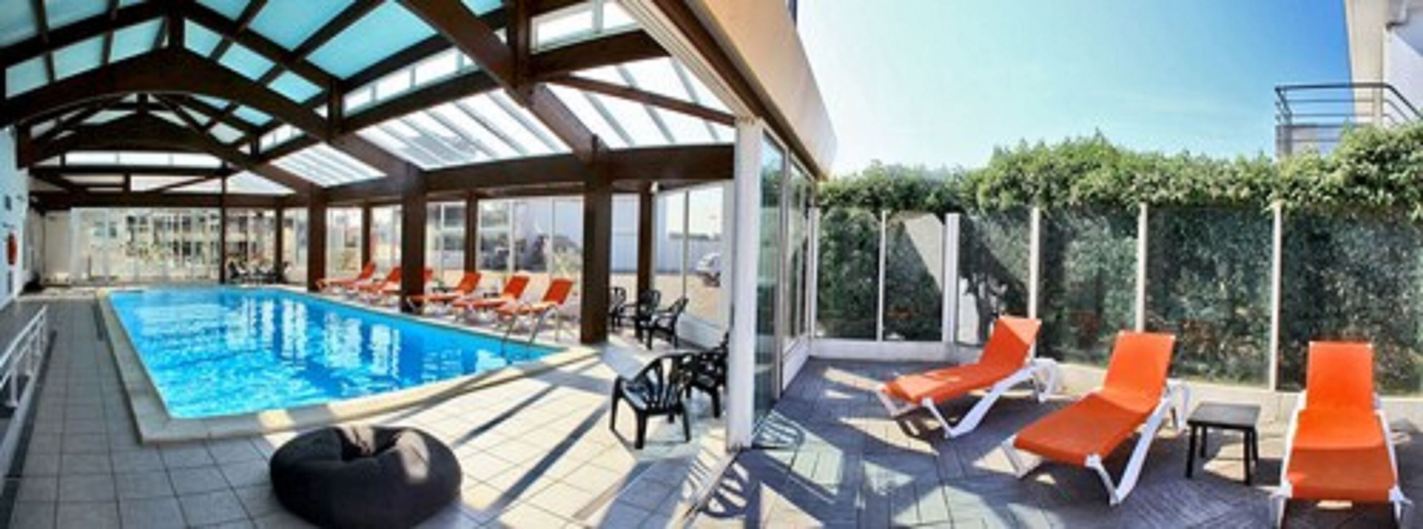 indoor pool, open 9 am to 9 pm, pool umbrellas, pool loungers