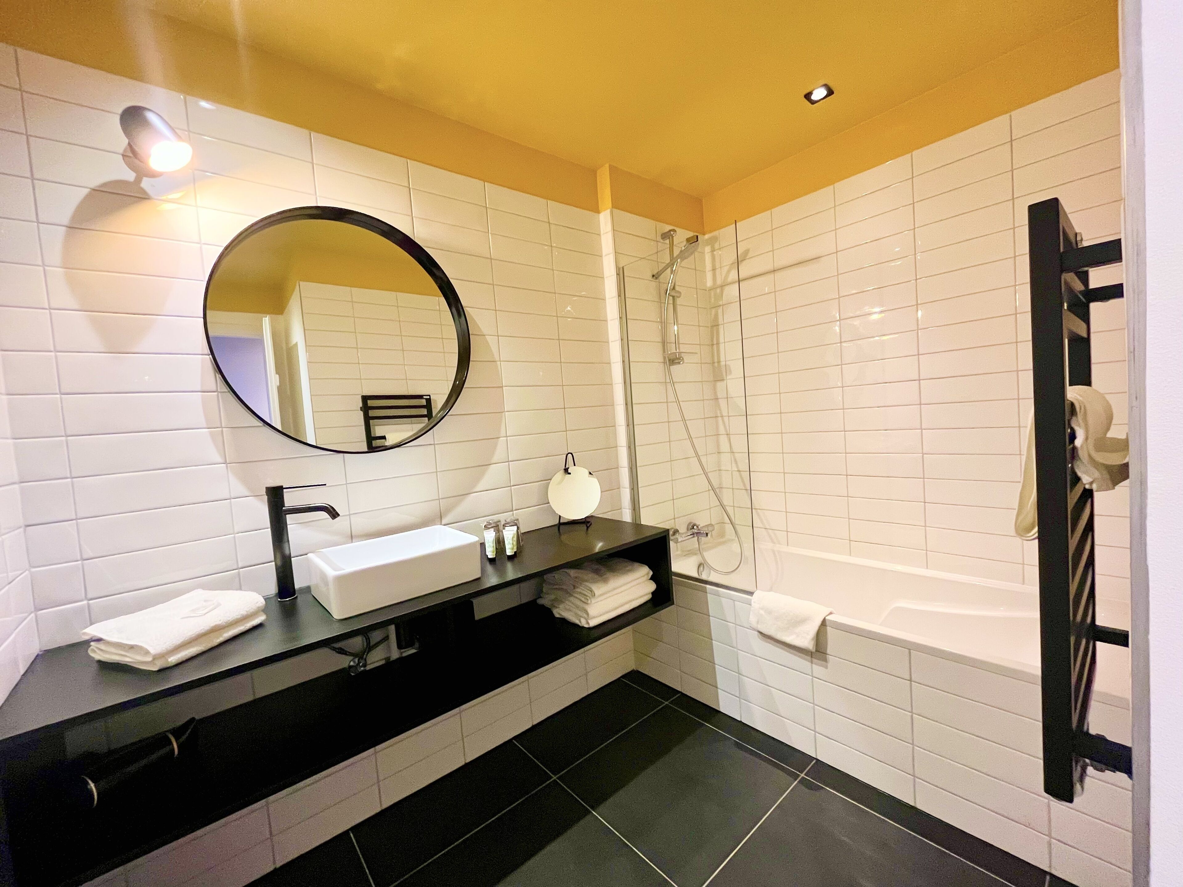 deluxe quadruple room | bathroom | free toiletries, hair dryer, towels