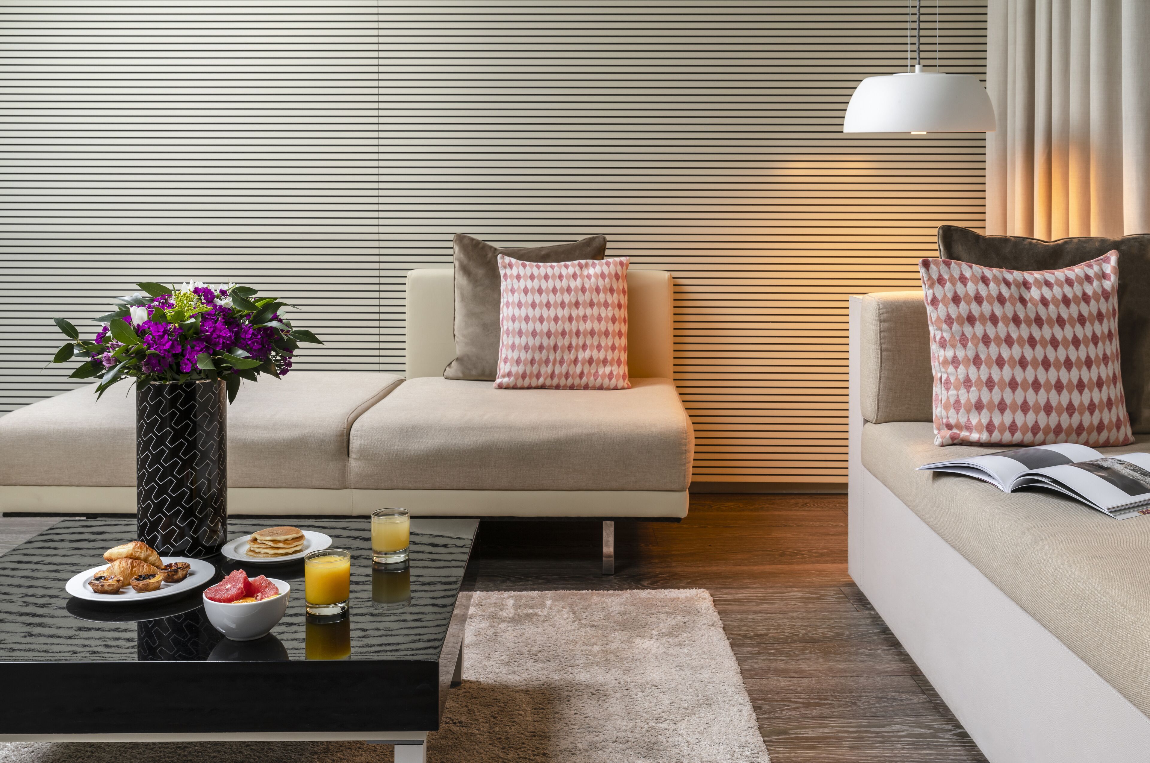 suite (mercy) | living room | 32-inch flat-screen tv with digital channels, tv, ipod dock