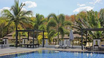 Outdoor pool, pool umbrellas, sun loungers