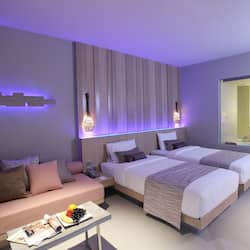 Deluxe Room | Premium bedding, minibar, in-room safe, individually decorated