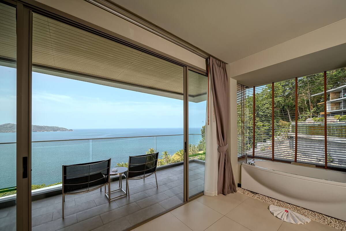 grand deluxe sea view  | living area | 46-inch led tv with satellite channels, tv