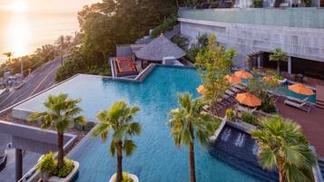 2 outdoor pools, pool umbrellas, pool loungers