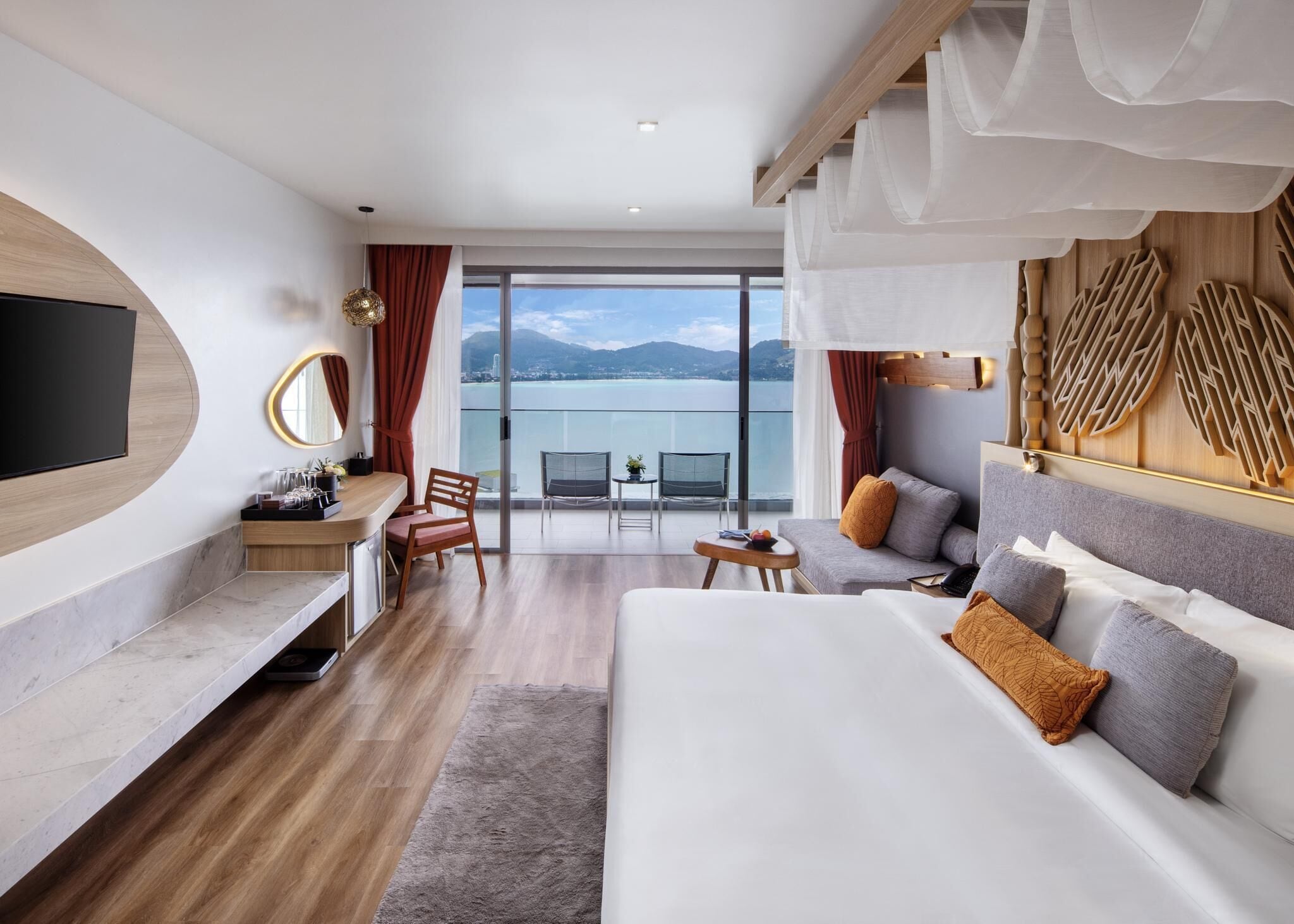 romance room with ocean view | premium bedding, minibar, in-room safe, individually decorated