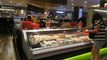 A food display in a store with various packaged items.