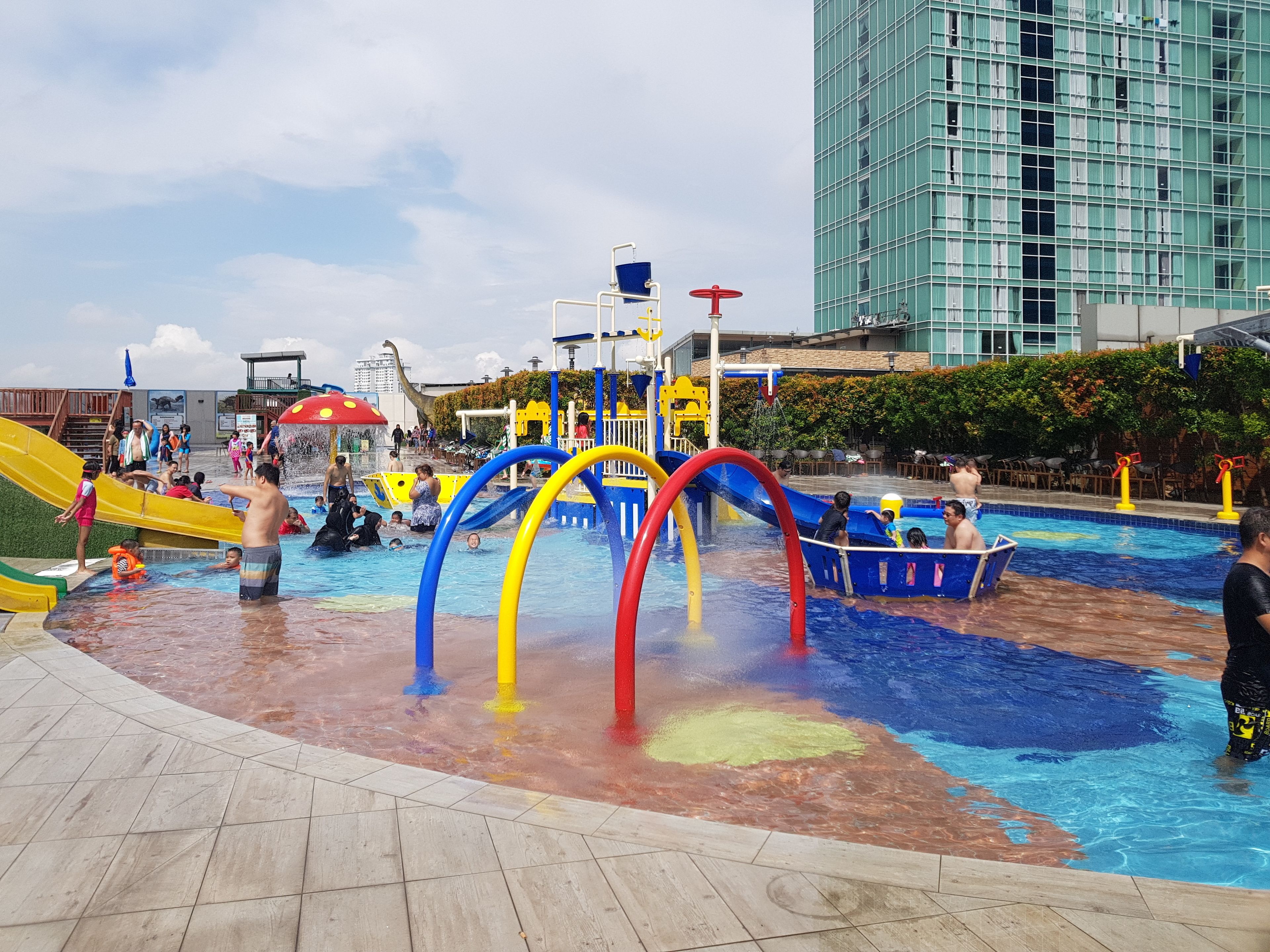 A water park with multiple slides and water play areas.