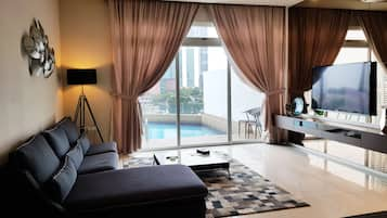 2 BR PREMIER (PRIVATE POOL B) 1K,1Q (Check in at D'Esplanade Residence)  | Living area | LCD TV