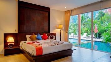 Family Room | Premium bedding, pillow-top beds, minibar, in-room safe