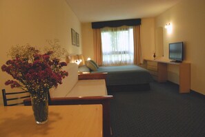 Hypo-allergenic bedding, down duvets, in-room safe