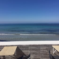 On the beach, sun loungers, beach umbrellas, beach towels