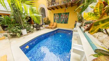 2 outdoor pools, pool umbrellas, pool loungers