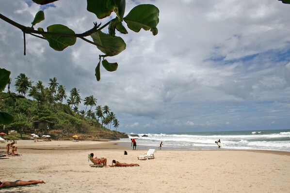 On the beach, white sand, beach towels
