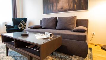Grand Apartment, 2 Bedrooms | Living area | 32-inch flat-screen TV with cable channels, TV