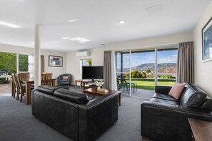 Superior Two Bedroom Apartment - Harbour View  | Living area | 42-inch flat-screen TV with cable channels, TV, DVD player
