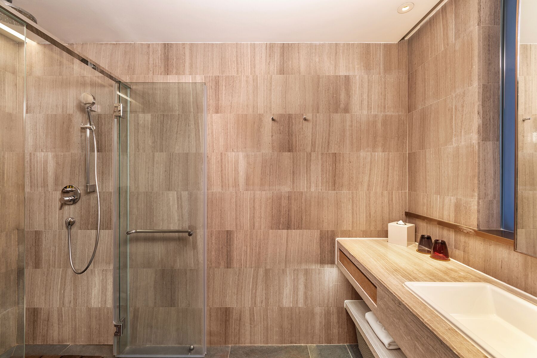 blissful corner room | bathroom | rainfall showerhead, free toiletries, hair dryer, dressing gowns