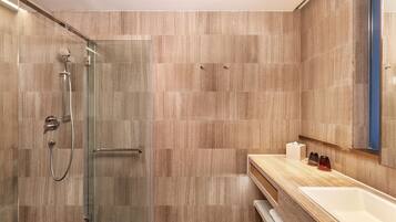 Blissful Corner Room | Bathroom | Rainfall showerhead, free toiletries, hair dryer, bathrobes