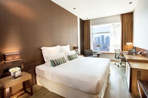 Blissful Corner Room | Free minibar items, in-room safe, desk, iron/ironing board