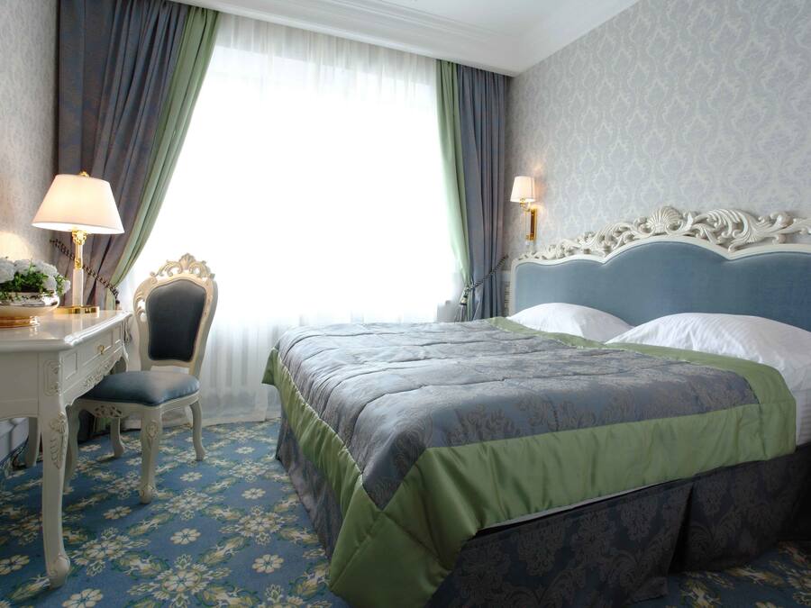 Desk, laptop workspace, free WiFi, bed sheets