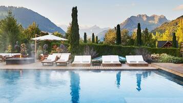 Indoor pool, outdoor pool, pool umbrellas, pool loungers