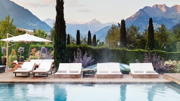 Indoor pool, outdoor pool, pool umbrellas, sun loungers