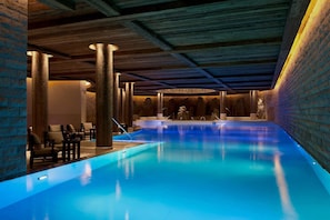 Indoor pool, outdoor pool, pool umbrellas, pool loungers