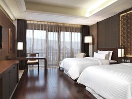 Premium bedding, down comforters, minibar, in-room safe