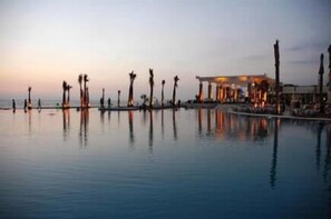 2 outdoor pools, pool umbrellas, pool loungers