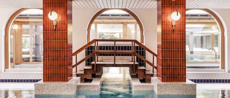 Indoor pool, seasonal outdoor pool, pool umbrellas, pool loungers