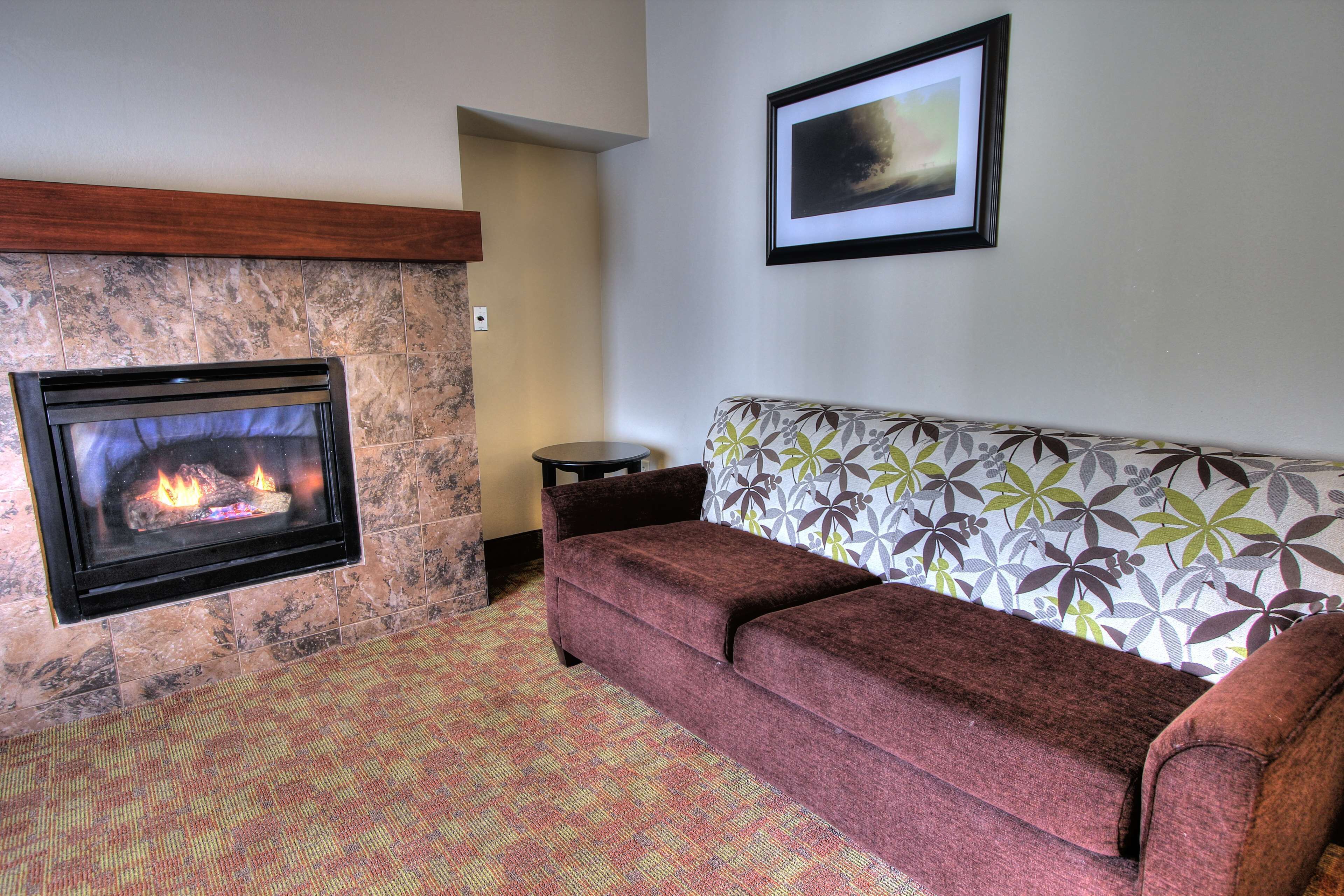 room, multiple beds, fireplace | desk, blackout curtains, iron/ironing board, free cots/infant beds