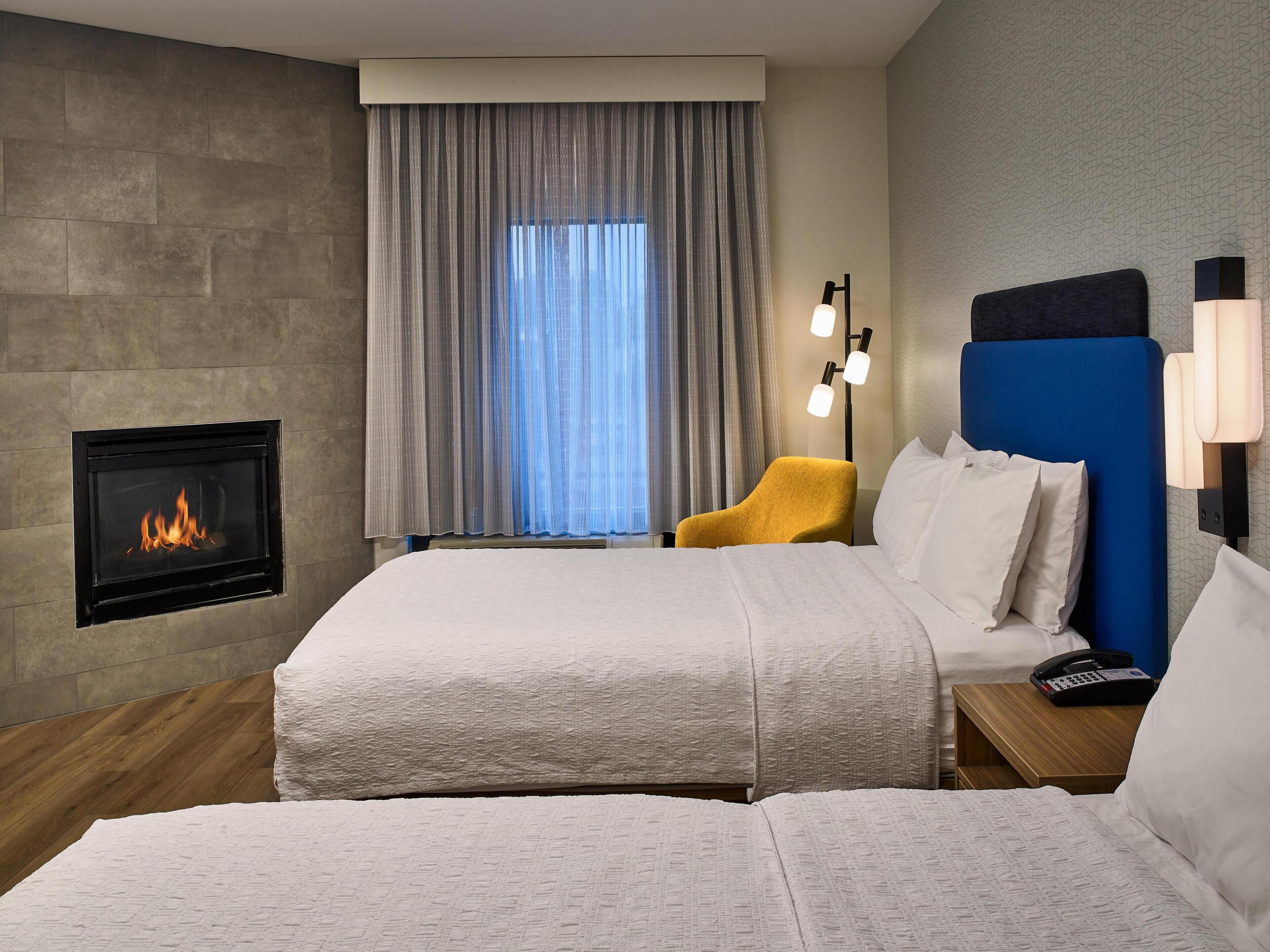 Room, 2 Queen Beds, Non Smoking, Fireplace | Desk, blackout drapes, iron/ironing board, free cribs/infant beds