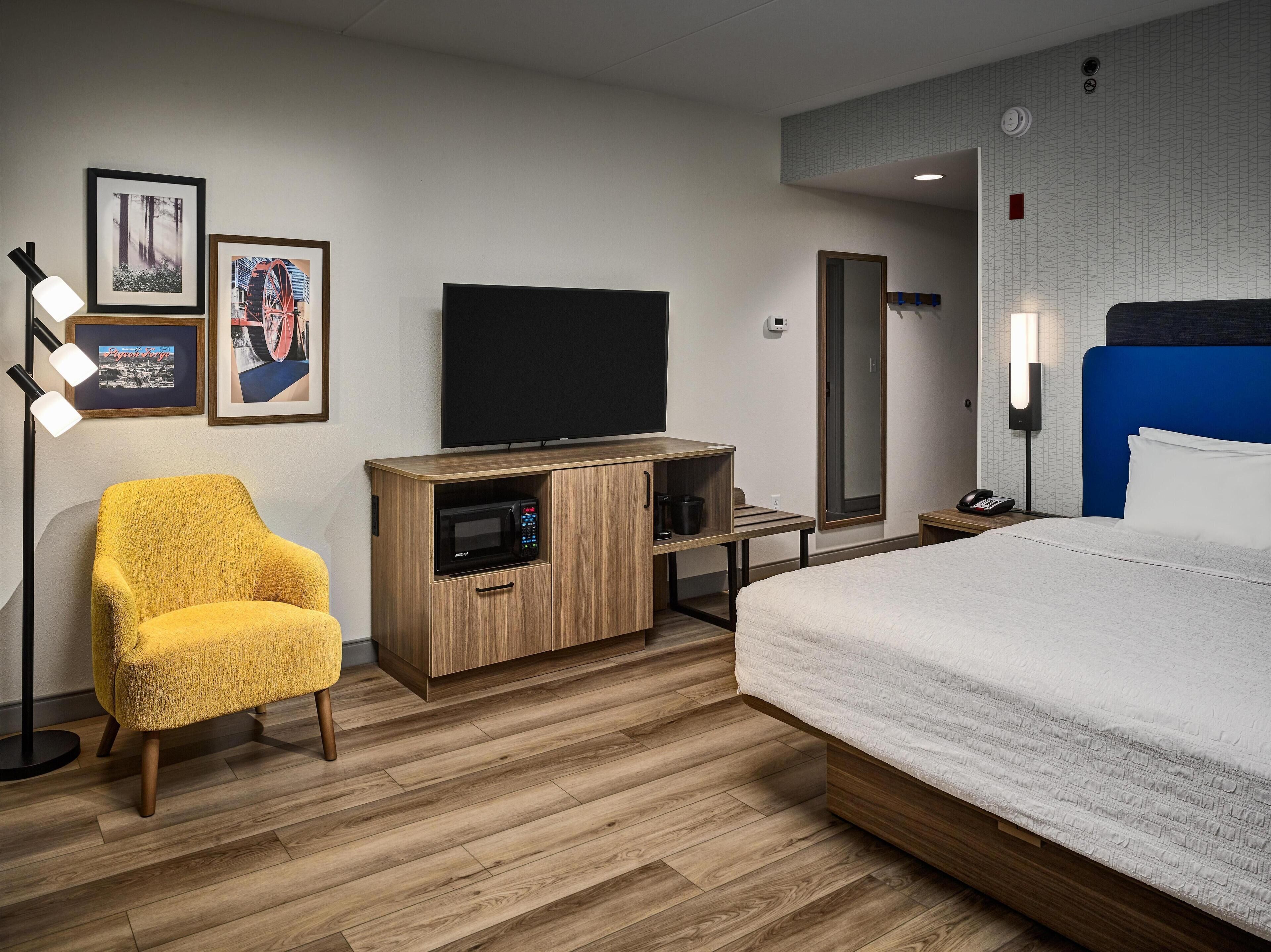 Desk, blackout drapes, iron/ironing board, free cribs/infant beds