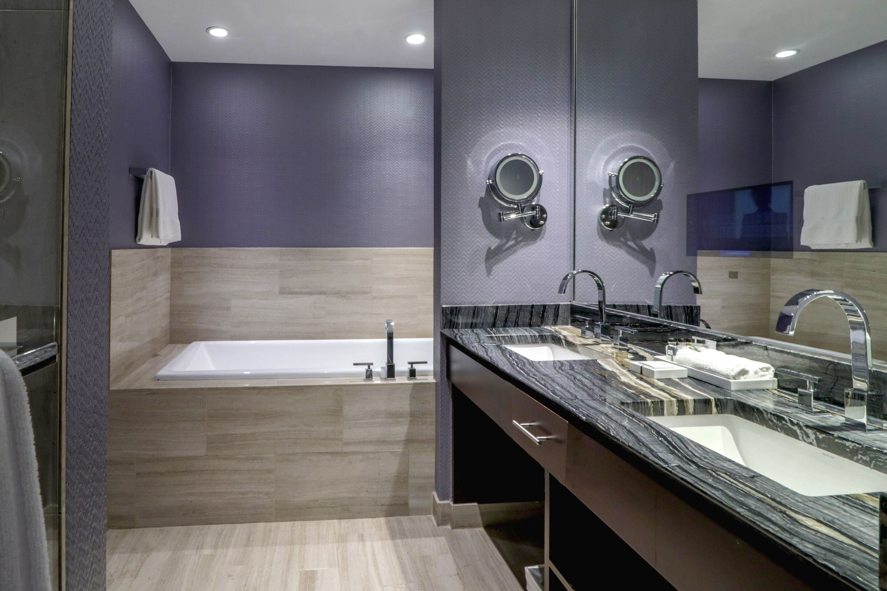 designer toiletries, hair dryer, towels