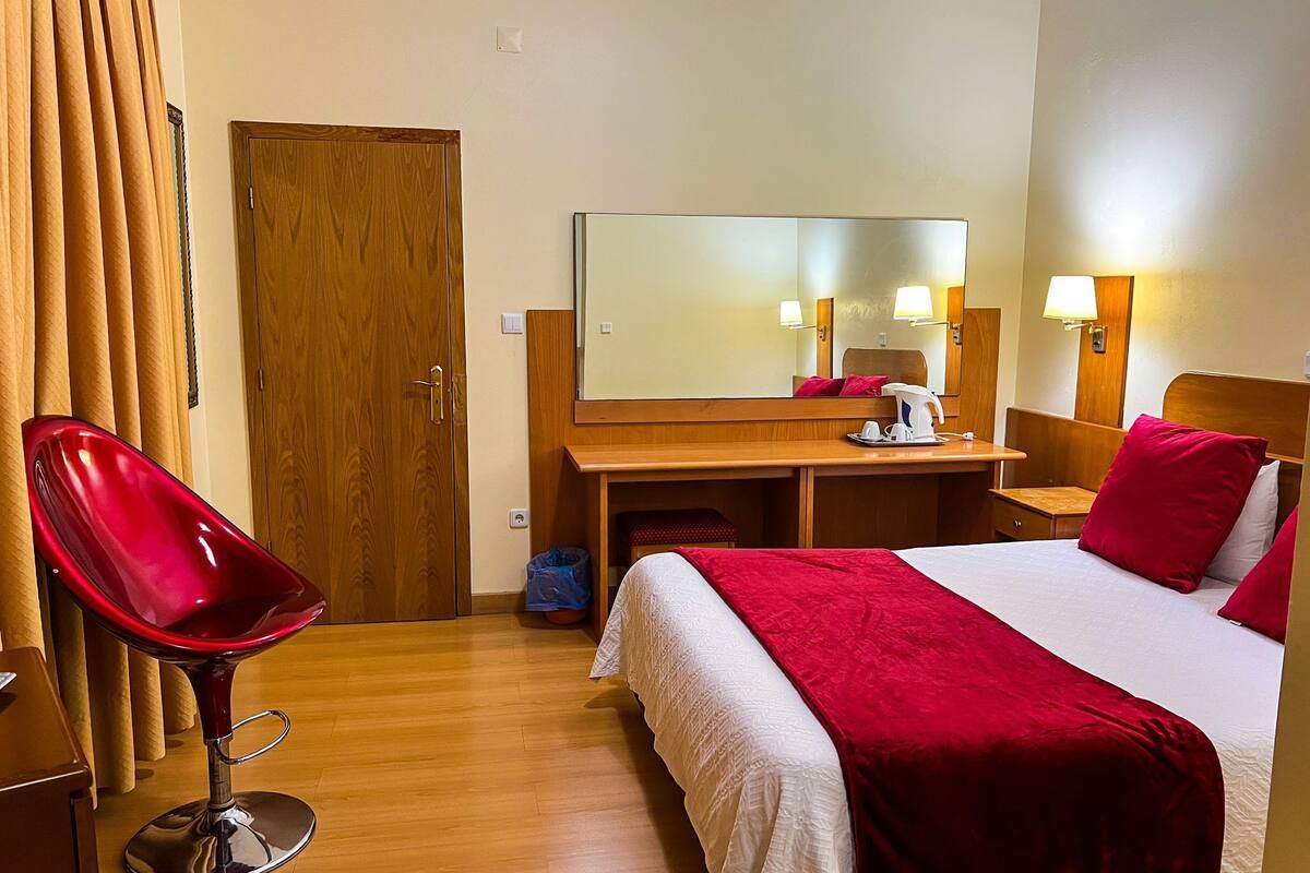 family room | 1 bedroom, minibar, in-room safe, blackout curtains