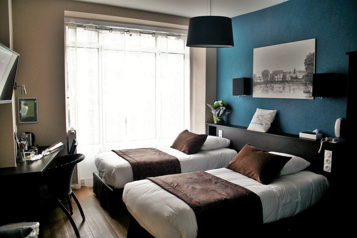 Premium bedding, desk, blackout curtains, soundproofing