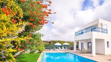 Outdoor pool, pool umbrellas, pool loungers