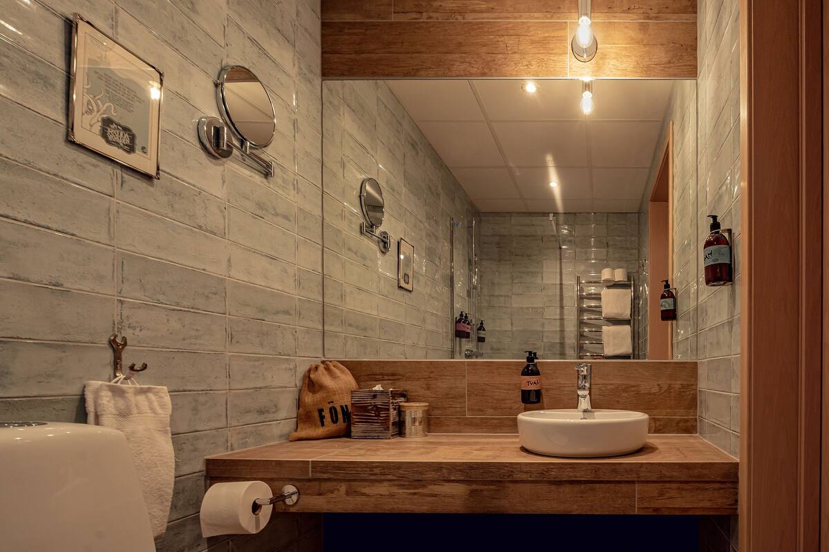 double room | bathroom | eco-friendly toiletries, hair dryer, bathrobes, towels