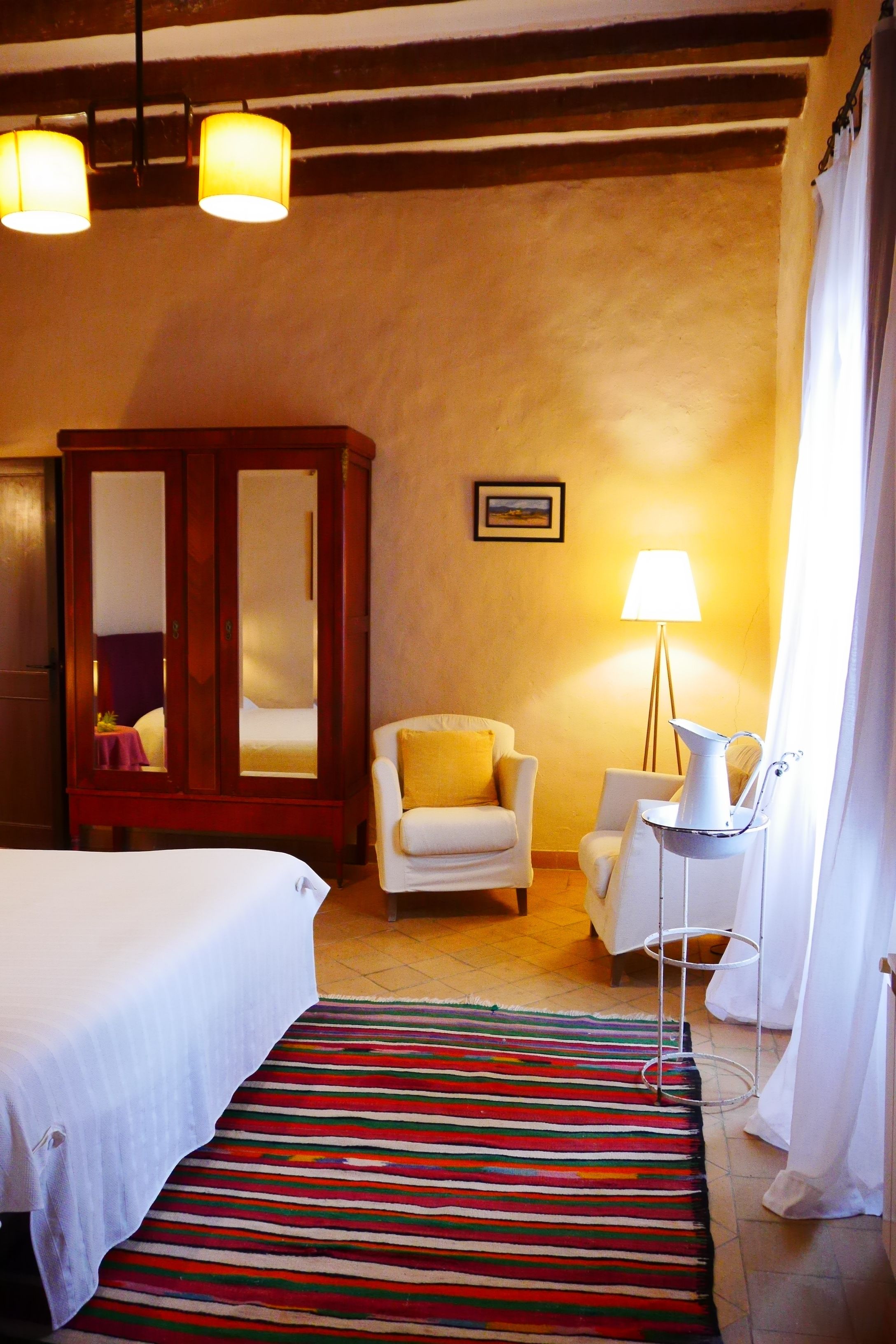 de la plana room | premium bedding, individually decorated, individually furnished