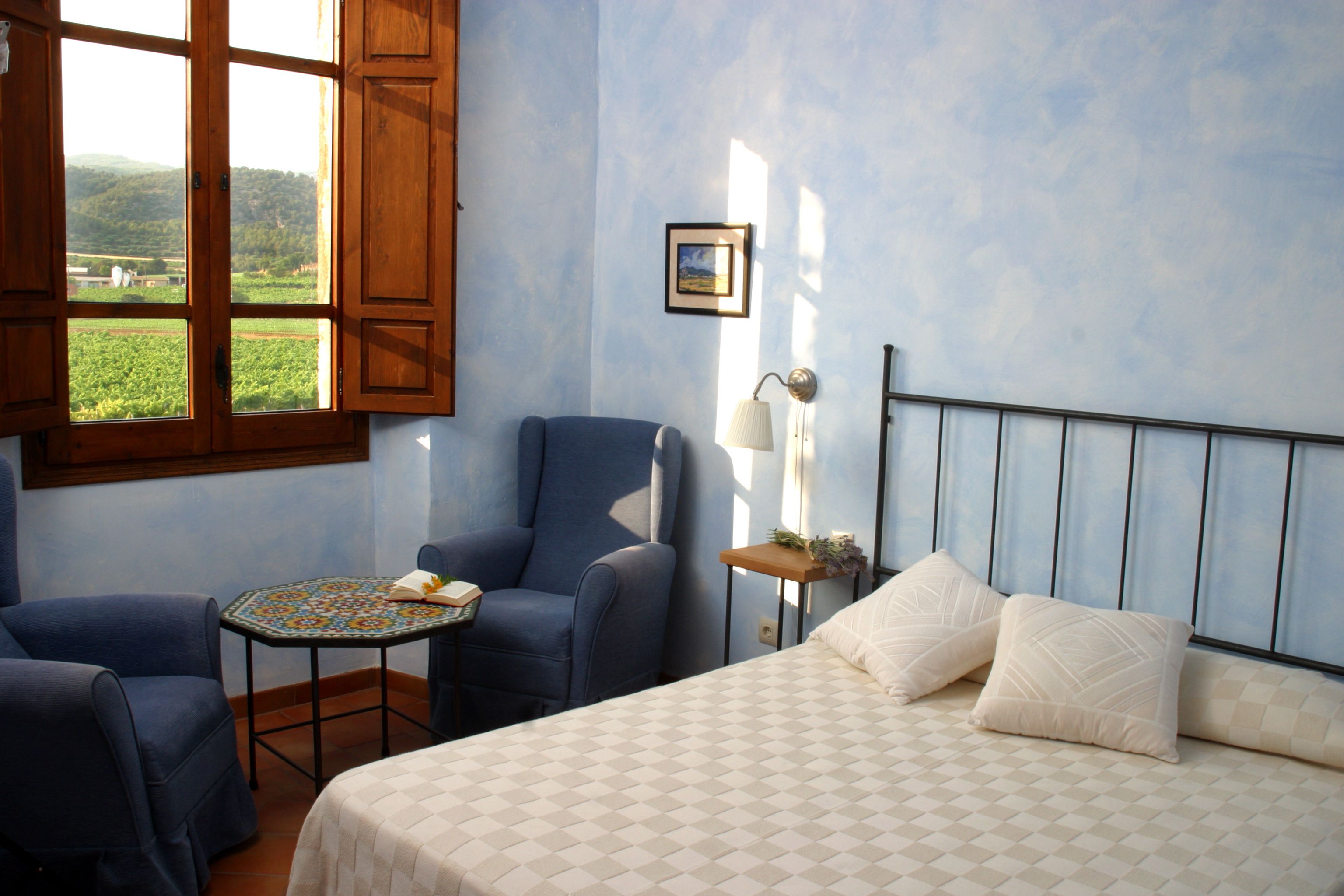 blue room | premium bedding, individually decorated, individually furnished