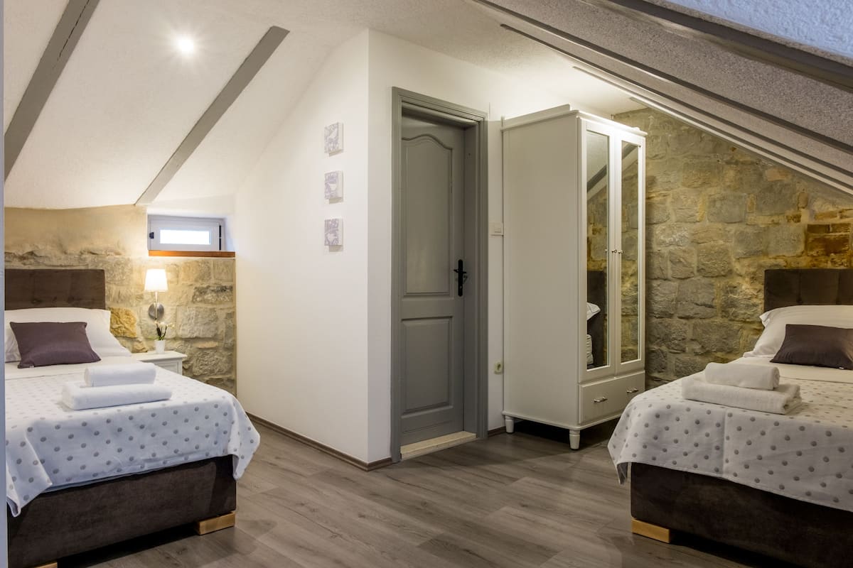 Premium bedding, desk, blackout curtains, soundproofing