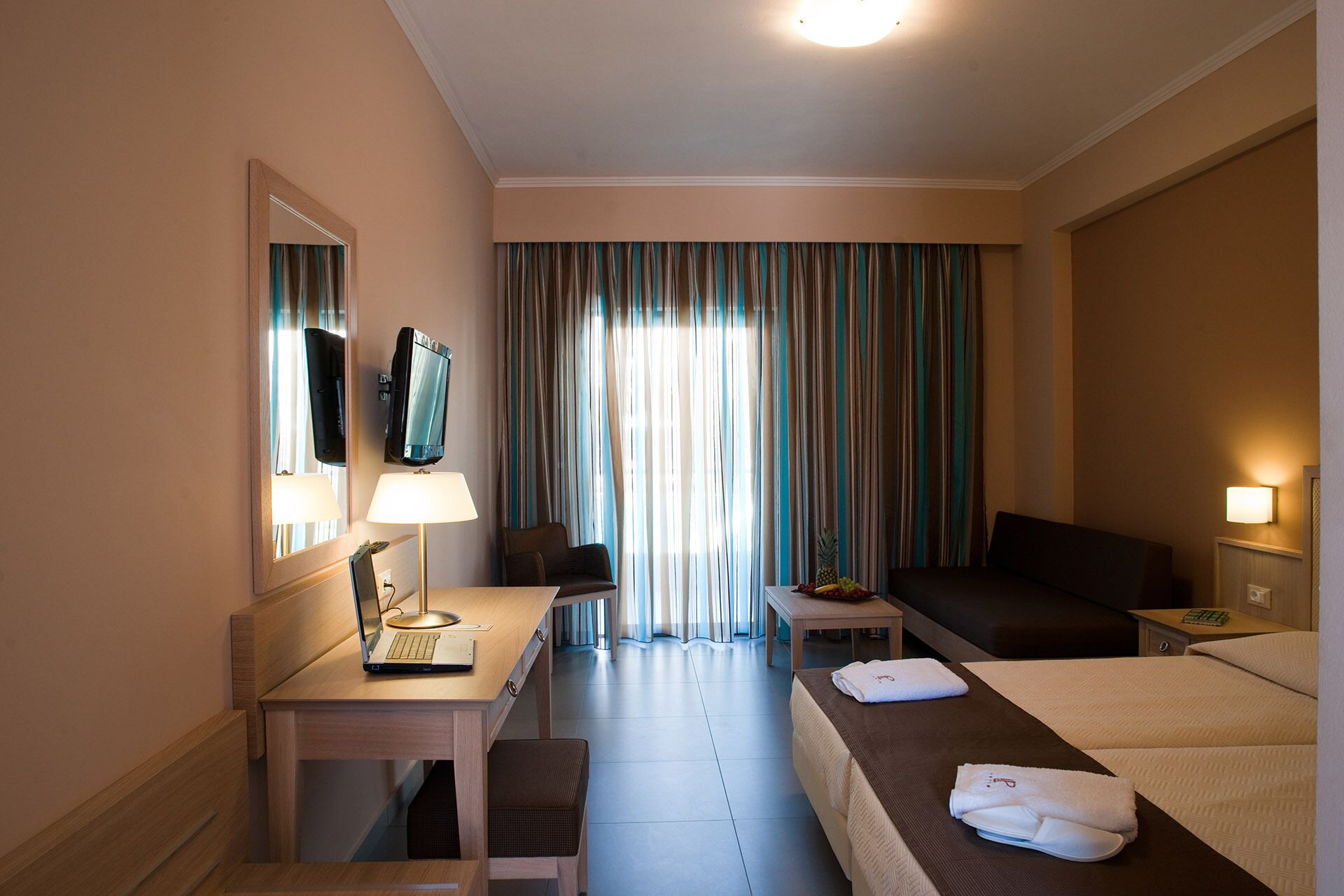 superior triple room with mountain/street view | minibar, in-room safe, desk, soundproofing