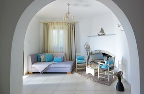 Suite, 2 Bedrooms | Living area | TV, books - Coriva Beach Hotel (Ierapetra)