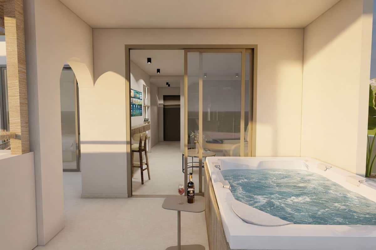 A modern interior with a hot tub, a bar area, and a view through a glass door.