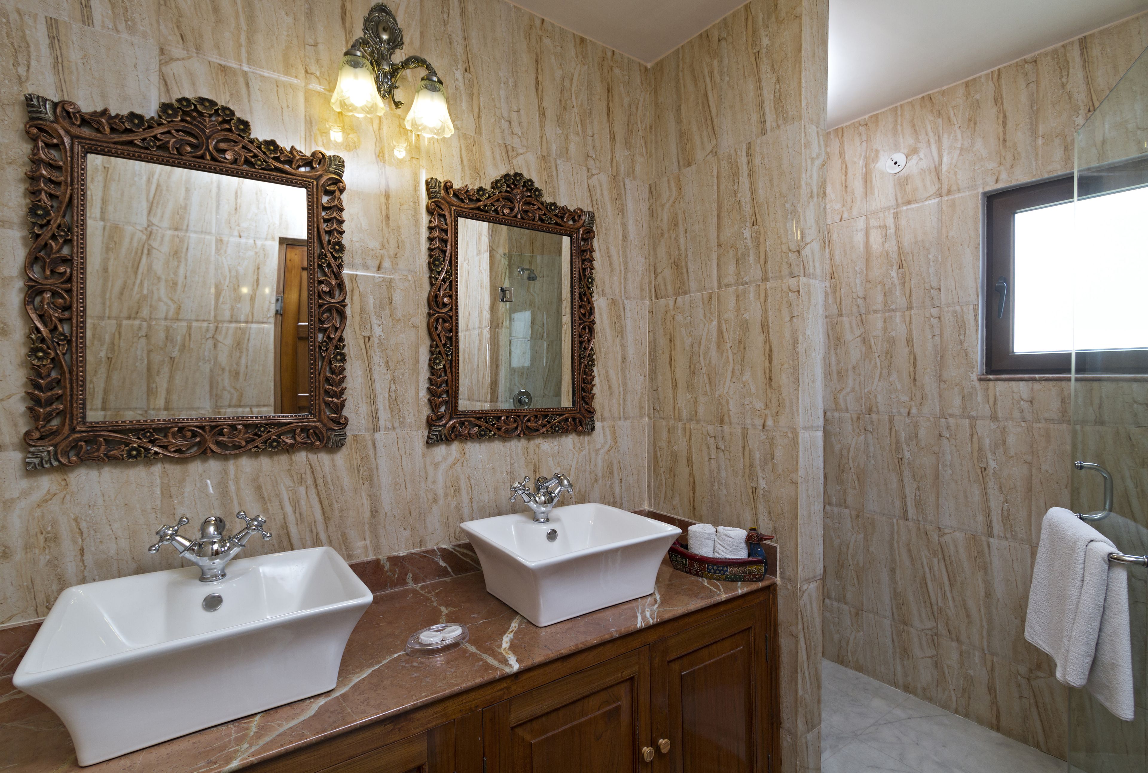 super deluxe room with complimentary airport pick up | bathroom sink