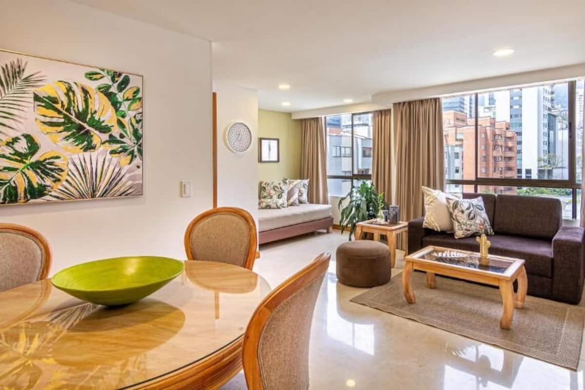 Superior Apartment | Living area | 43-inch Smart TV with satellite channels, TV
