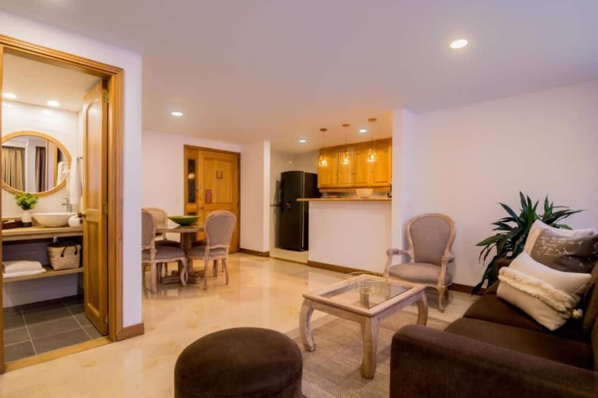 Superior Apartment | Living area | 43-inch Smart TV with satellite channels, TV