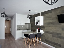 Superior Studio 4 guests | Living room | 36-inch flat-screen TV with digital channels, TV