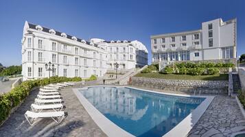 Outdoor pool, pool umbrellas, pool loungers