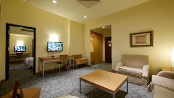 Executive Suite, 1 Bedroom | Living room | TV, DVD player, iPod dock